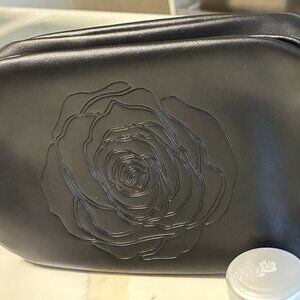 Lancôme makeup with the classic Lancôme rose motif makeup bag